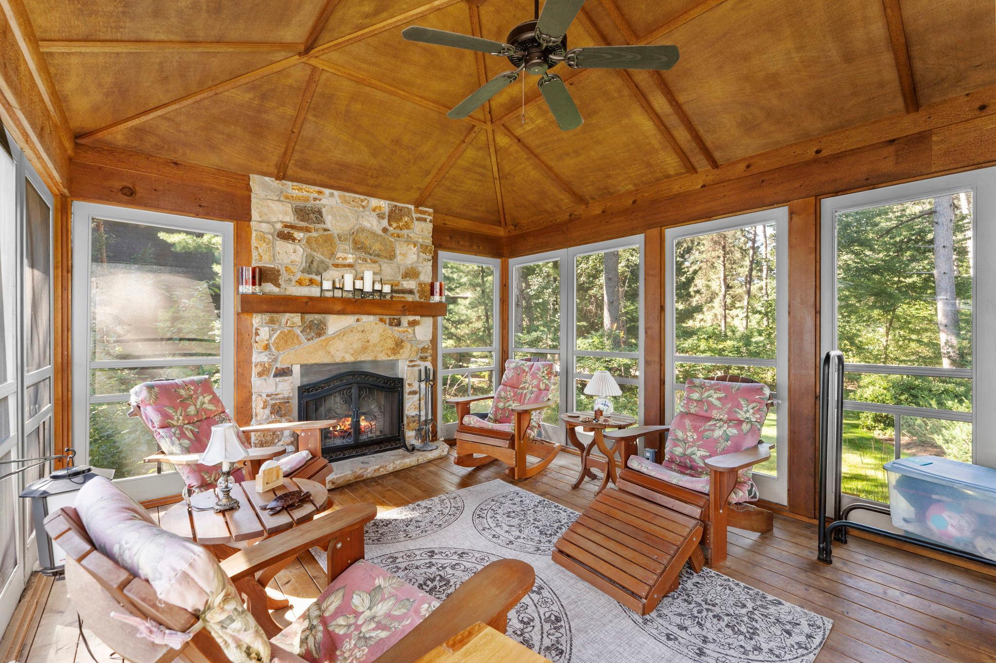Screened porch with wood burning fireplace