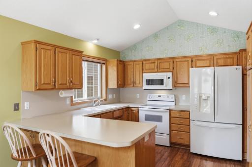 Enter your large dine-in kitchen right off the front entry.