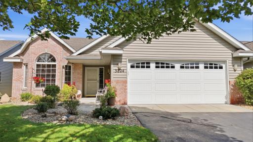 Inviting garage door welcomes you home to your two car garage