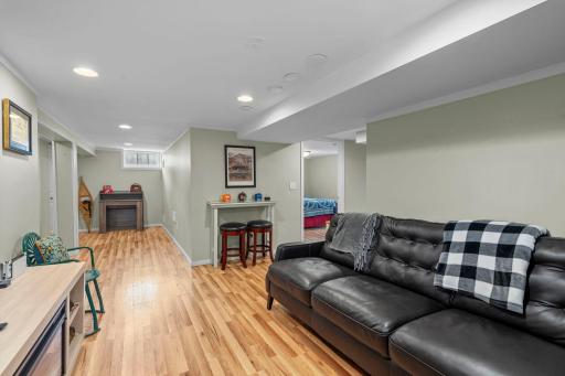 Full size amusement room with hardwood floors.