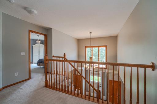 The upper level features 3 bedrooms, 2 bathroom and the laundry.