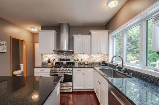 Large, bright windows take in backyard views from the kitchen.