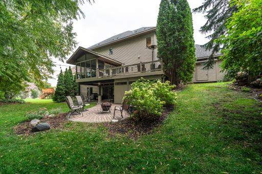 Beautifully-landscaped paver patio and fire pit