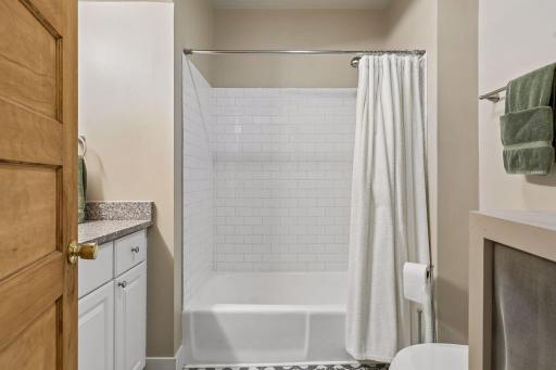 Second floor full bath. Updated tile flooring and the tub was reglazed in 2023.