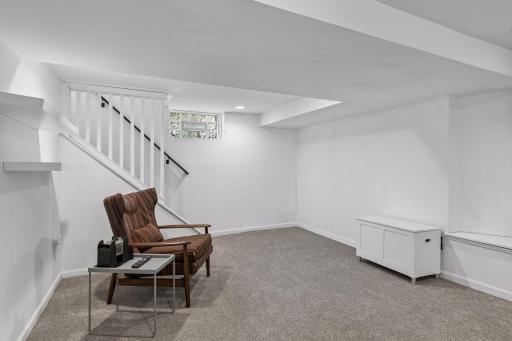 Finished lower level provides a family room, 5th bedroom, and 3/4 bath.