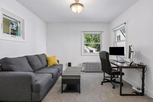 Main floor bedroom or office with French doors and a walk-in closet. Plus 2 new Andersen windows and BRAND NEW carpet!