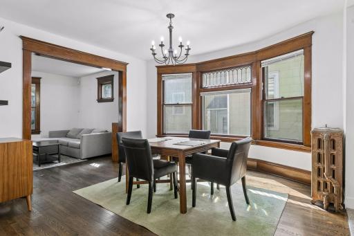 Spacious formal dining room with matching bay window to the living room.