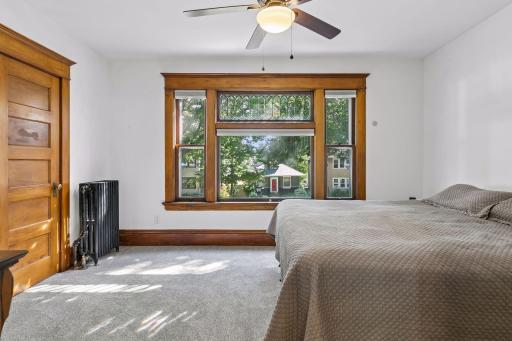 One of three upper level bedrooms - ALL with brand new carpet. Beautiful front facing bedroom with a walk-in closet.