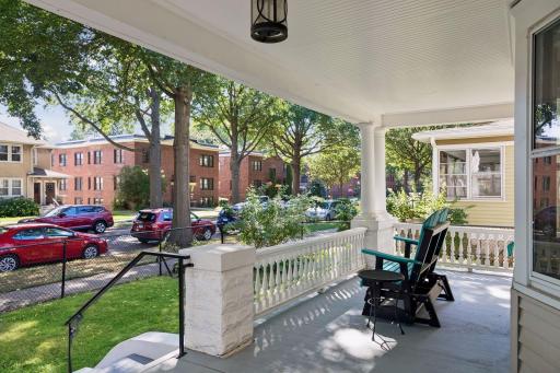 Open and welcoming front porch. The lot is fully fenced in the front and back yard.