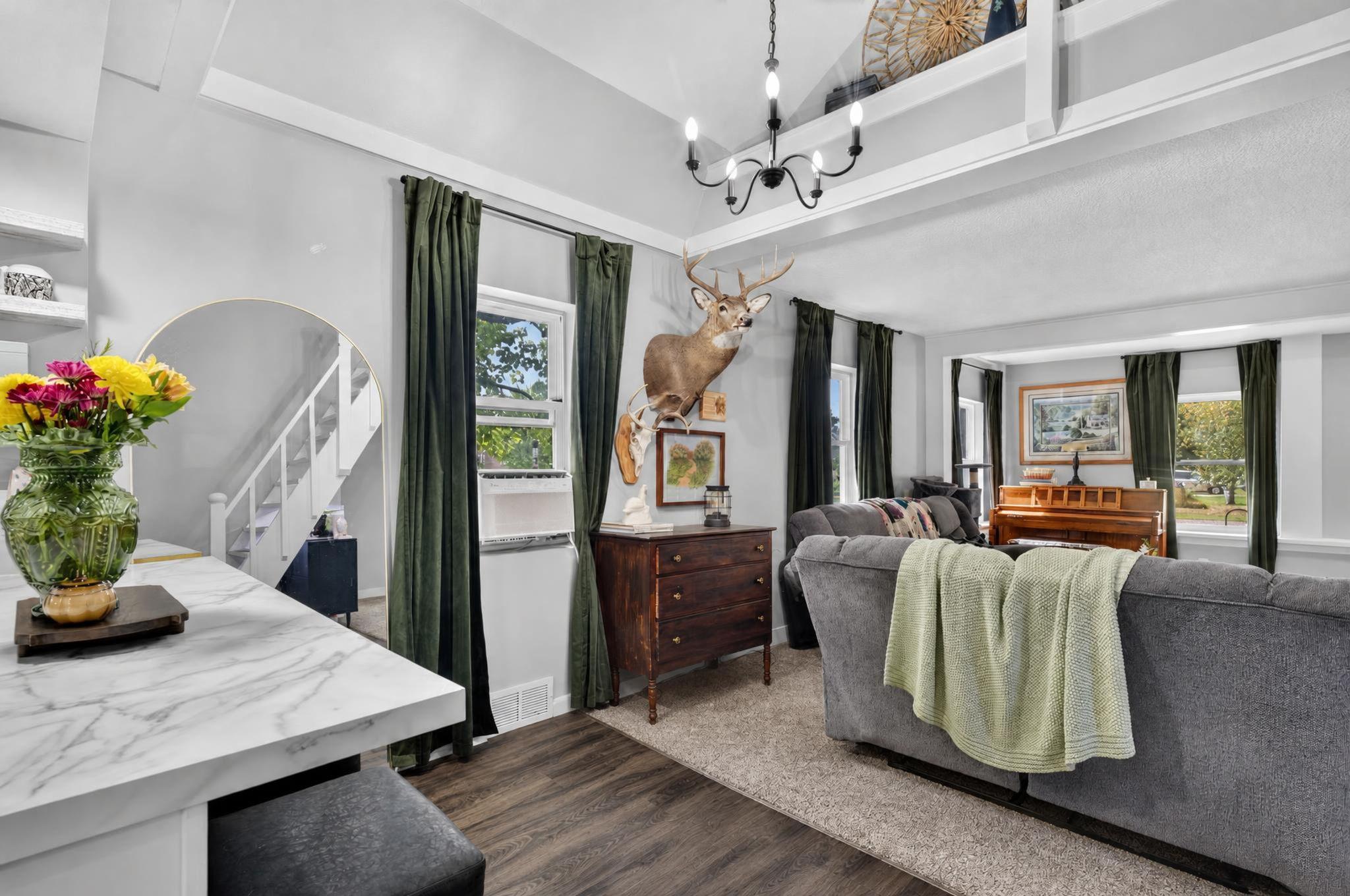 Thoughtful details, including the stylish chandelier, add character and charm throughout the home.