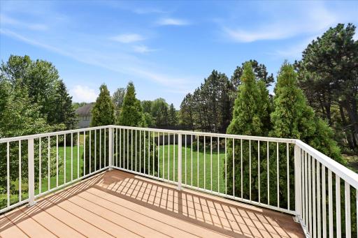 Enjoy your morning coffee on the deck overlooking the spacious backyard.