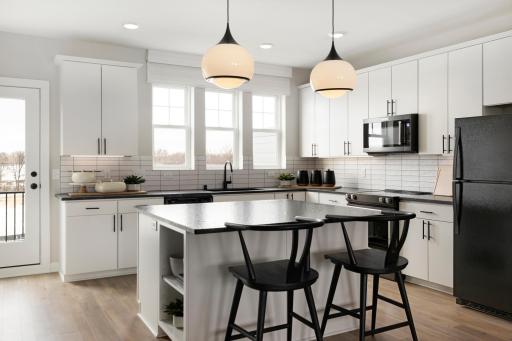 Photo is of a similar model home.