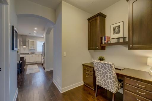 A built-in desk/office workspace off the kitchen adds impressive functionality to the home.
