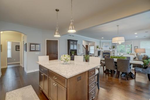 Nine-foot ceilings and hickory hardwood floors enhance the open main level.