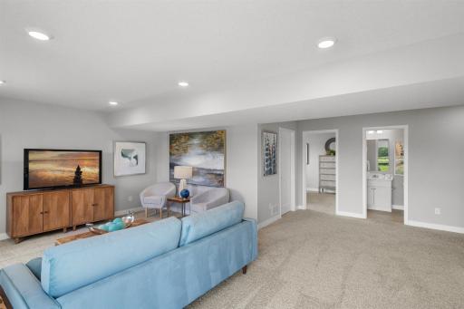 Lots of room to roam in the lower level finished basement. Pictures of model home colors and options will vary.