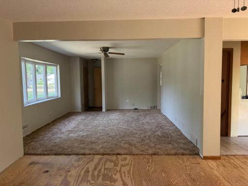 Oversized living room with bay window.