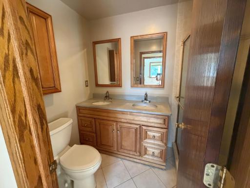 One of two bathrooms. Double vanity.