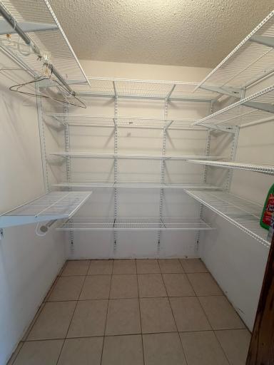 Nice walk in closet off the front door. Was used as a huge pantry. Tile floor.