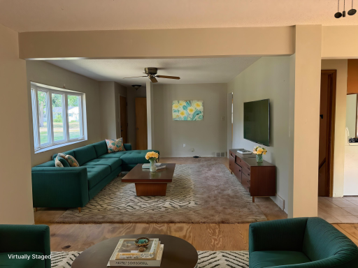 Virtually Staged living room with bay window.