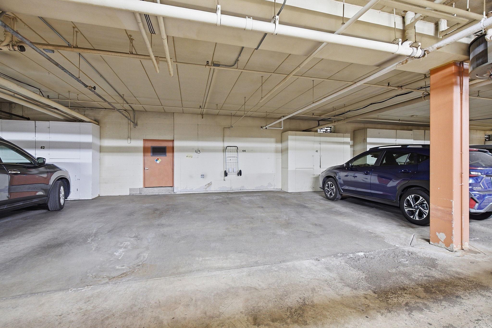 Heated Garage (space #44) - Underground parking keeps vehicles protected from the elements, with designated parking areas and convenient access within the Laurel Hill community.