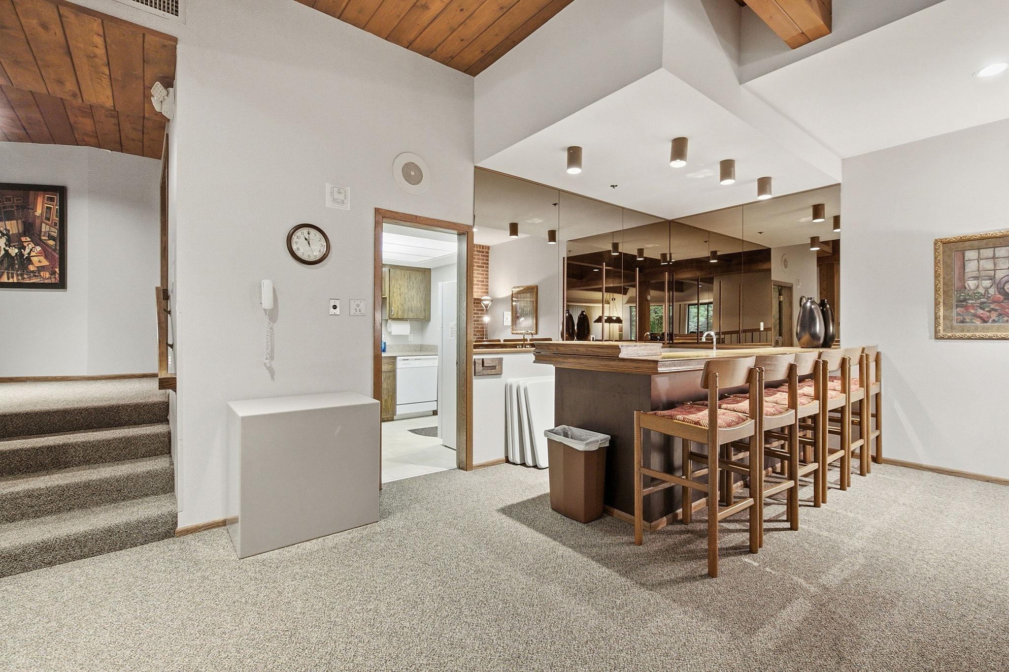 Community Room Bar Area - Community room bar area with counter seating and convenient access to the adjoining kitchenette.