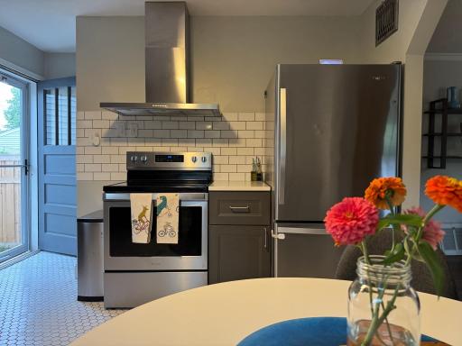 Kitchen featuring newer SS appliances