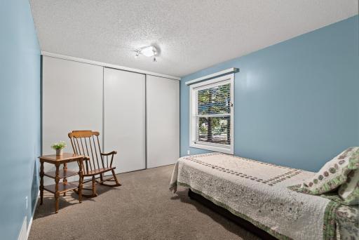 Secondary bedroom 1 with tons of closet storage