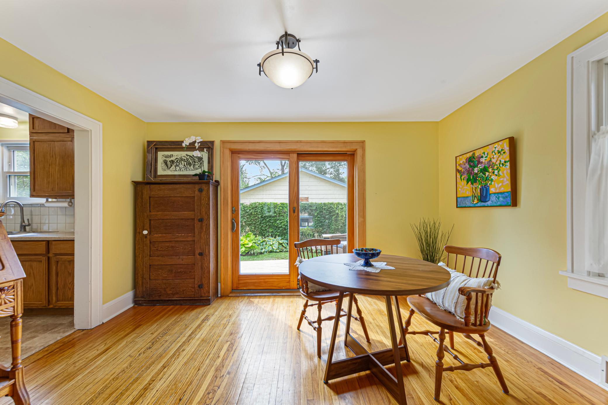 Dining room with kitchen and back deck access
