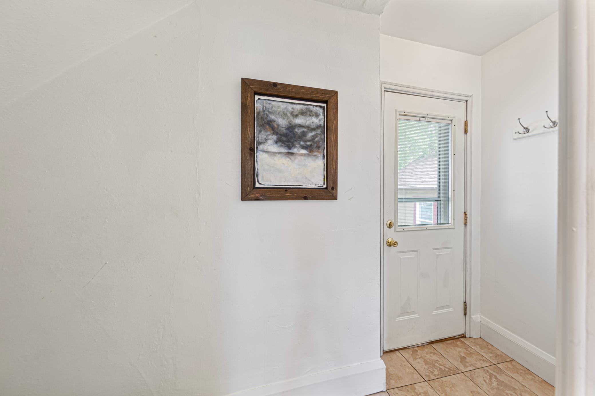 Secondary entryway on side of house off the kitchen