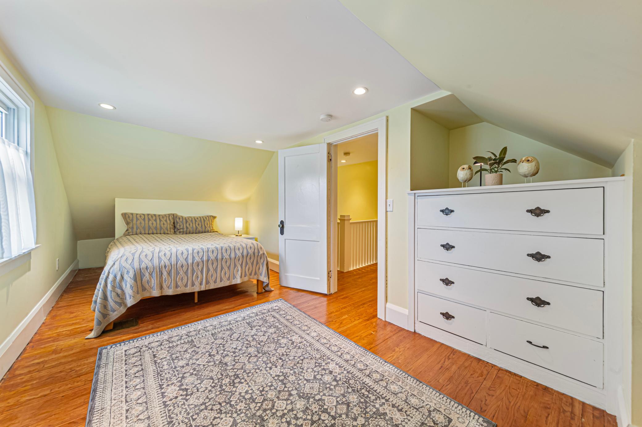 Bedroom #2 on upper level with oversized built-in dresser