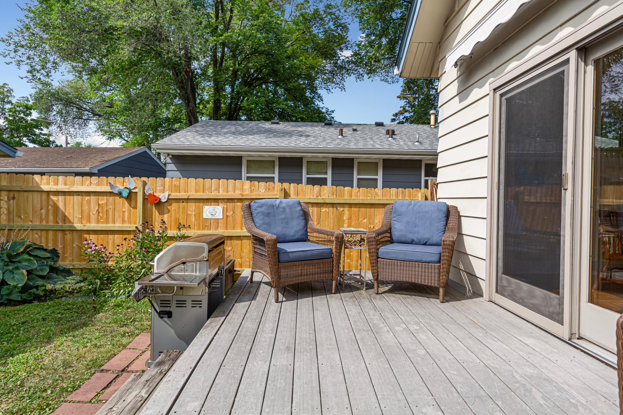 Enjoy moring coffee or grilling out in the serene backyard.