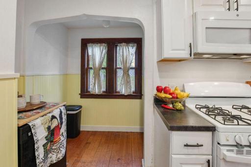 Cozy nook just off the kitchen. Adds extra space to sit and read a good book or use as a mud room. There is a second entrance that leads to the back yard.