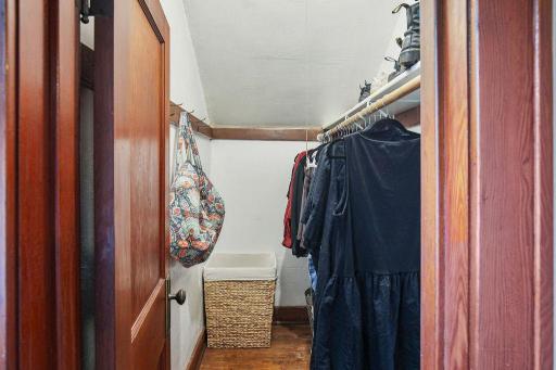 Generous walk-in closet provides plenty of hanging and storage space.