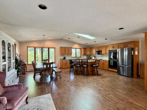 updated luxury vinyl planking & vaulted ceiling