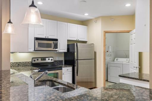 Wonderfully spacious, bright kitchen with granite counters