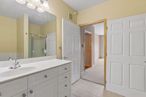 Owner's private bath with tub and separate shower