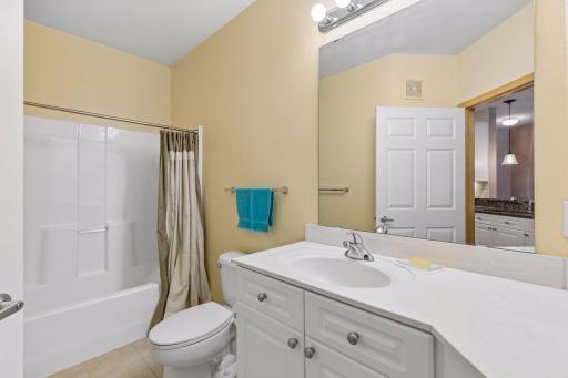 Main bathroom next to kitchen and 2nd bedroom
