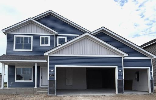 3117 Jandura Ave NE- New Construction Home will be ready for an October Move-in! Highlights include a 4 BAY GARAGE (934 Sq. Ft.) and Concrete Front Porch located on a WALKOUT HOMESITE! Stone Accents, Garage Doors, & Driveway will be installed soon.
