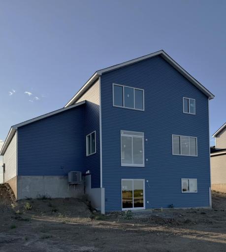 3117 Jandura Ave NE- Rear elevation features a walkout lower level to spacious backyard.