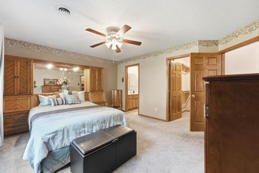 Features a walk in closet and full bathroom.