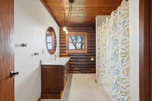 The main floor, full bathroom located near the two bedrooms