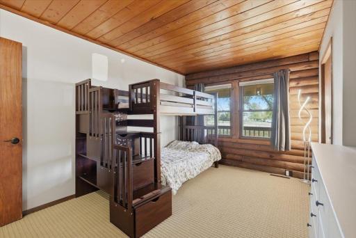 2nd bedroom, located next to primary overlooks the front yard and is cozy as can be