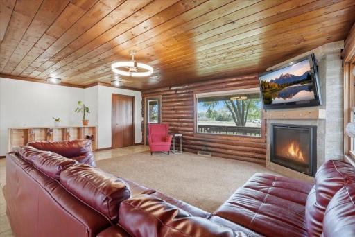 This gas burning fireplace and southern window view make this property rural and cozy for all seasons
