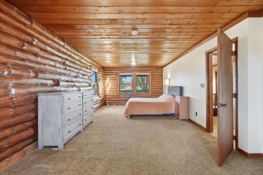 This primary bedroom is absolutely massive and could easily be converted to two bedrooms or left large as is