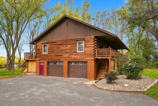 Beautiful covered front porch, storage, heated and insulated garage and much more!