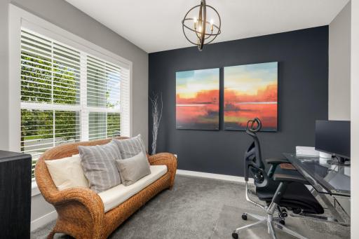 Dedicated main-level office offers natural light and a comfortable work-from-home space.