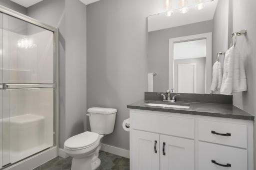 Secondary bedroom includes convenient direct access to an adjoining bathroom.