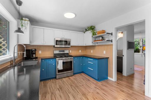 Inset two-tone cabinetry brings a custom, elevated look and offers a substantial upgrade over typical overlay or frameless cabinetry.