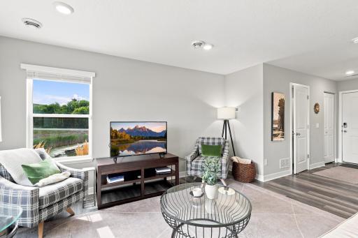 Spacious living room overlooking the wetlands