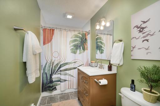 Beautifully updated main-floor full bathroom.